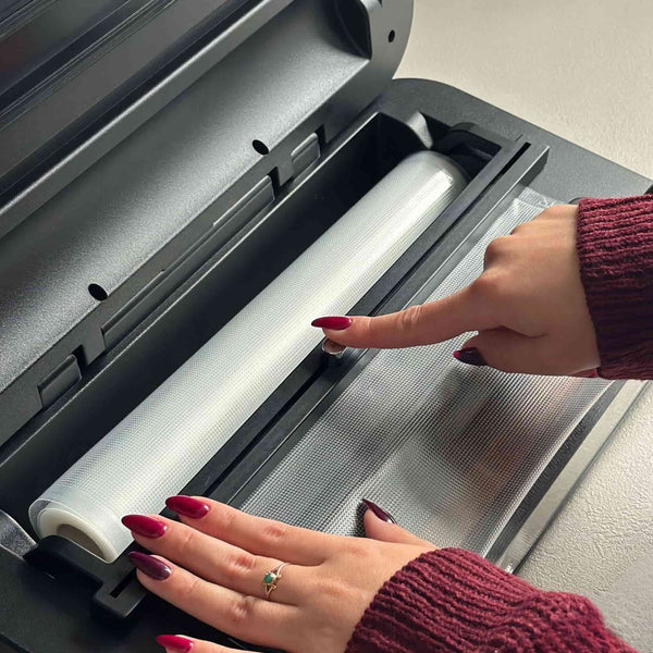 utilizzando una macchina sottovuoto